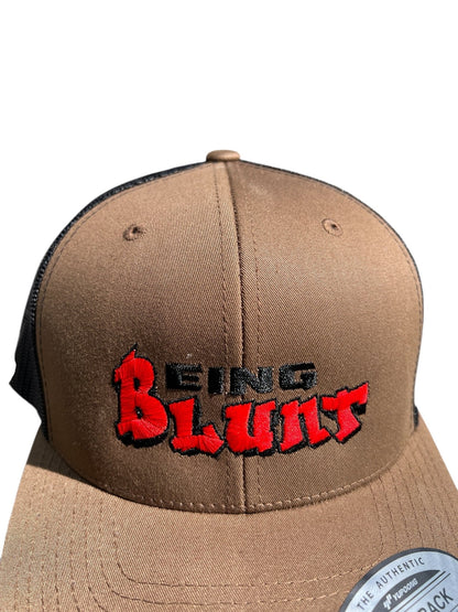 Being Blunt  Radio's Last Outlaw," J.Biggs coyotee tan and black Trucker Cap - Shop Battle Born Clothing
