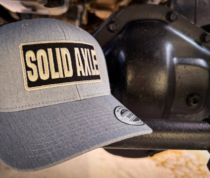 Yupoong Solid Axle Snapback Trucker Hat | Battle Born Clothing - Shop Battle Born Clothing